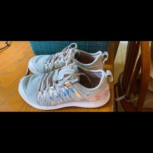 Girls light pink metallic under armor shoes